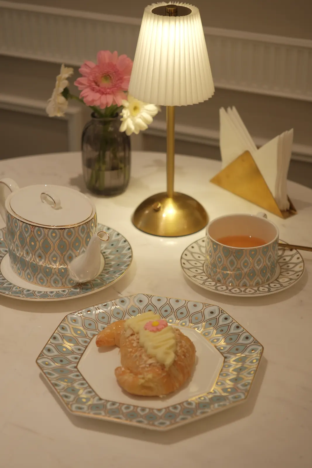 Croissant with cream and a small flower — Crema Pastry · Classyc Hàng Buồm