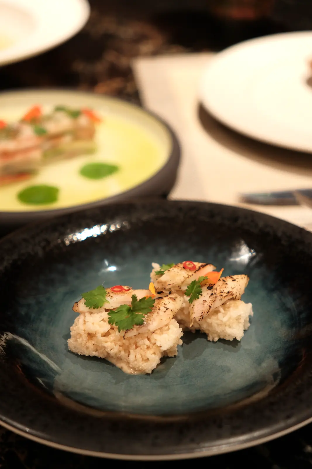 Rice topped with seared fish and chili — Lumé Restaurant · Classyc Hàng Buồm