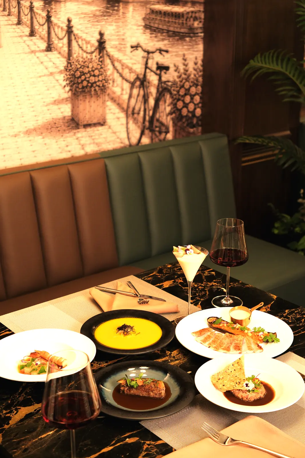 Table of soup, fish, meat and shrimp with red wine — Lumé Restaurant · Classyc Hàng Buồm
